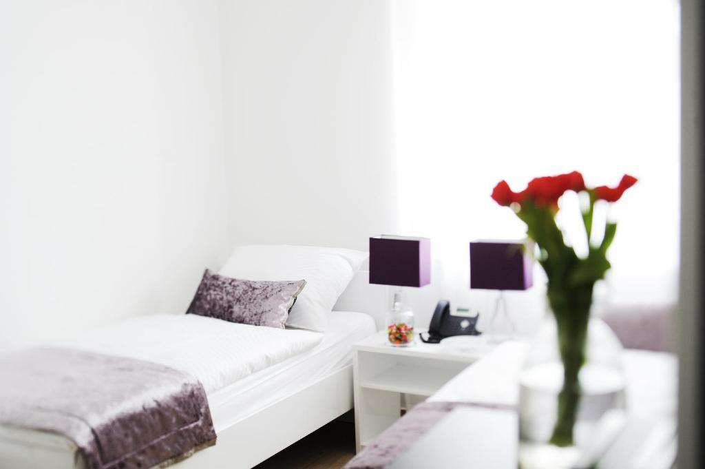 Garni Hotel Azur Liubliana Quarto foto